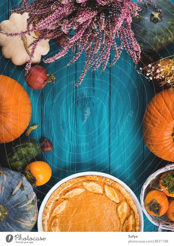 Autumn thanksgiving background with pumpkin pie autumn table sweet cake dinner flatlay wood rustic card celebration composition concept orange bake halloween