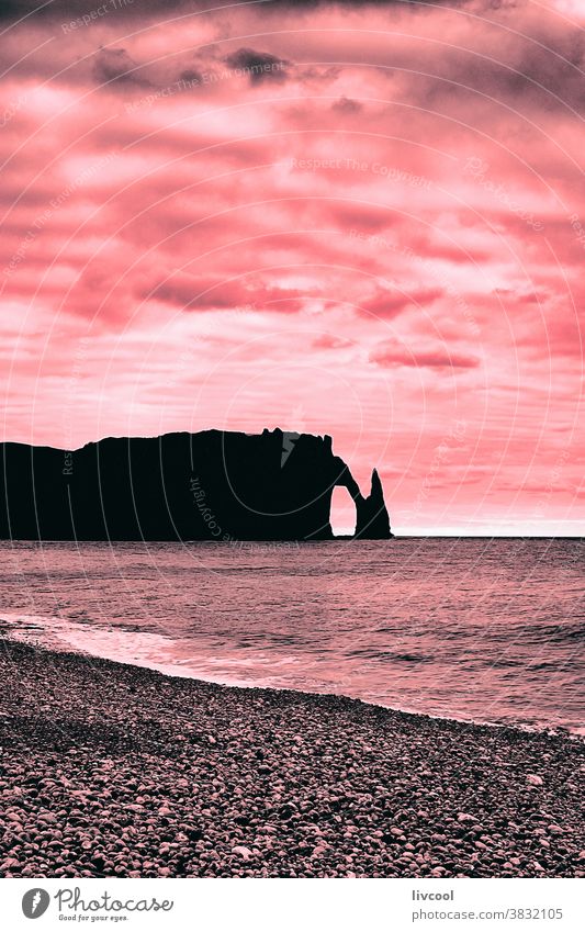 cliffs of etretat on pink background porte daval landscape blue hour la porte damont coast beach scene clouds sea seashore outdoors twilight afternoon romantic