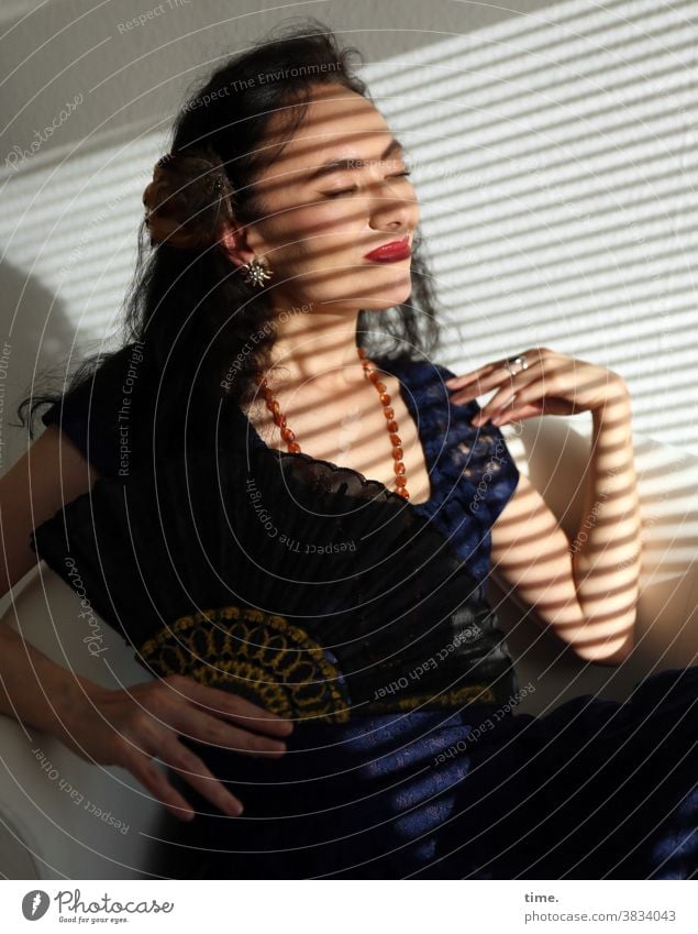 Sirinya Woman Dark-haired Long-haired Dress Colour Guide Sit sunbathe To enjoy sunny Shadow room Stripe Venetian blinds Jewellery Chain Closed eyes