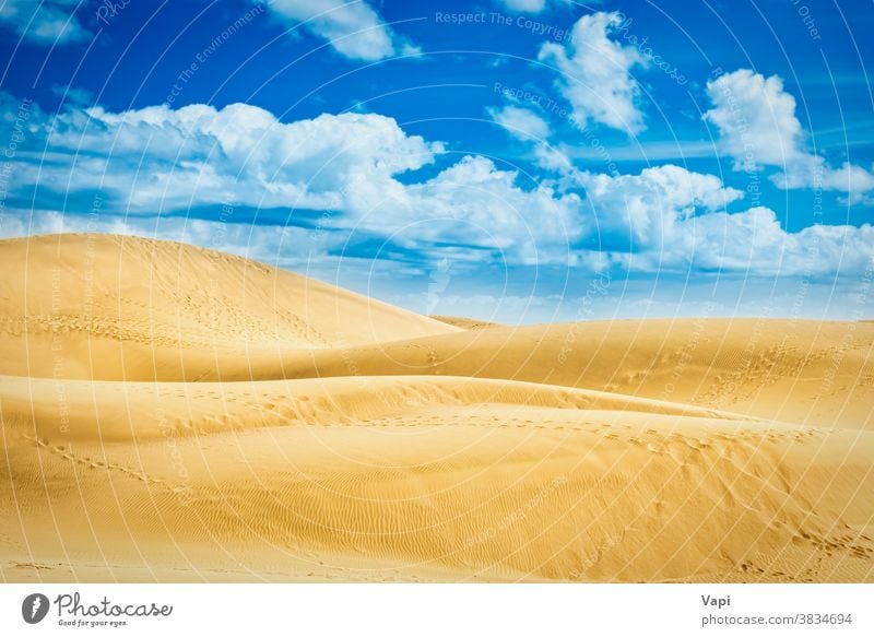 Desert with sand dunes and clouds on blue sky desert hills natural landscape reserve canary maspalomas gran canaria spain nature travel summer atlantic beach