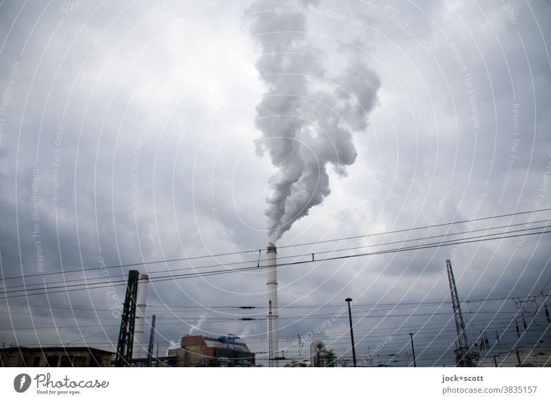 Combined heat and power plant for the climate Industry Energy industry Clouds Chimney Smoke Authentic Environmental pollution Climate change Lack of inhibition