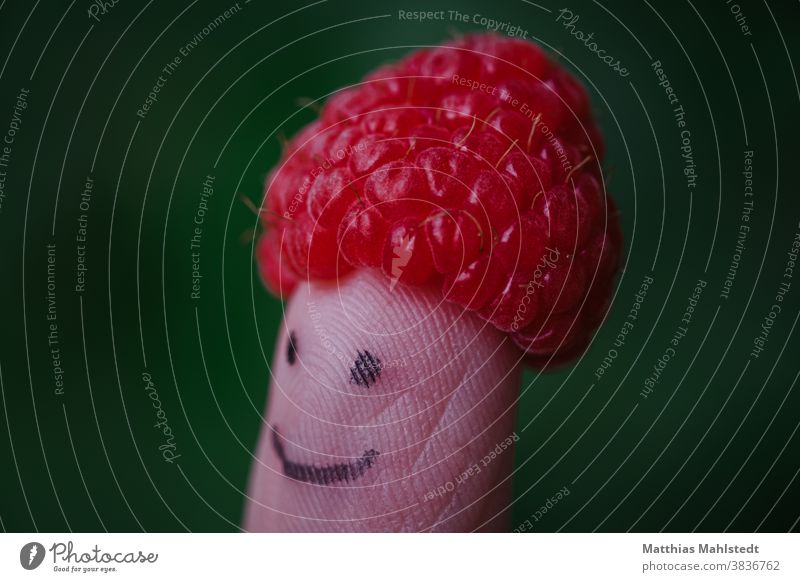 Raspberry Hat Funny Face Joy portrait Happiness Human being Smiling Happy Exterior shot Positive Cheerful fruit Infancy Child Copy Space left Copy Space right