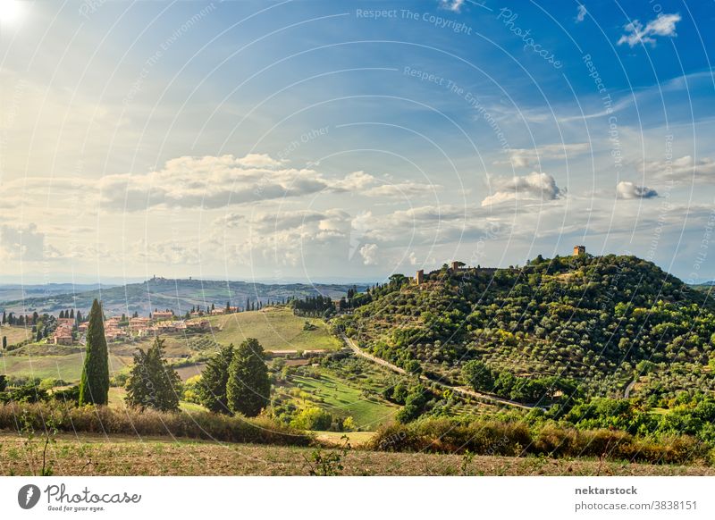 Hills of Tuscany and Summer Landscape hill field sky landscape cloudscape Italy crop rural rolling hill Europe day natural lighting farmland sunny summer crops
