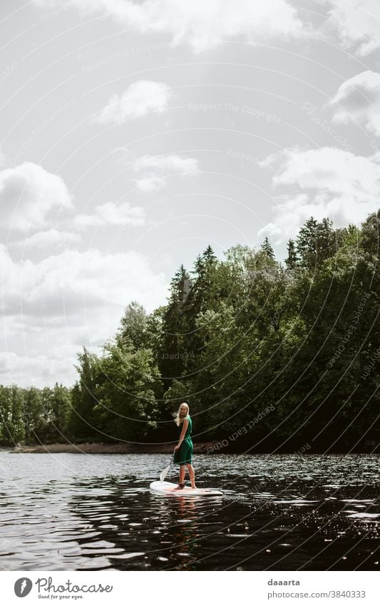 SUP summer woman vacation puddle forest river mood nostalgia lake stan-up puddle wind enjoyment freedom feelings of happiness happy young trip outdoors sunshine