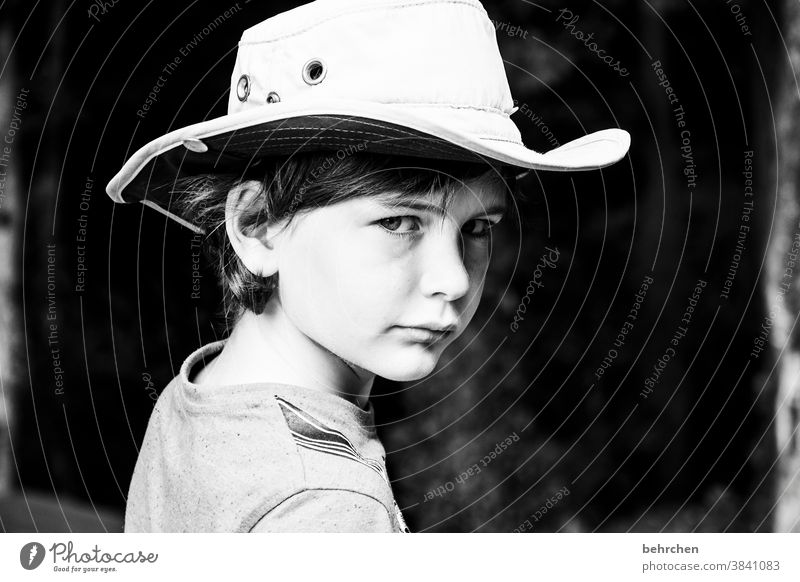 come on, get the lasso out... Cool Cool (slang) Cowboy hat Hat Brash expectant Expectation Love pretty observantly Close-up Child Boy (child) Family & Relations