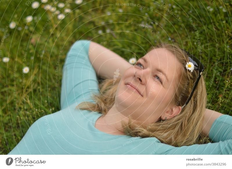 young blonde wife in mind | far away Woman Meadow Lie relax To enjoy Relaxation youthful Blonde Smiling pretty Turquoise light blue Blue ponder in thought