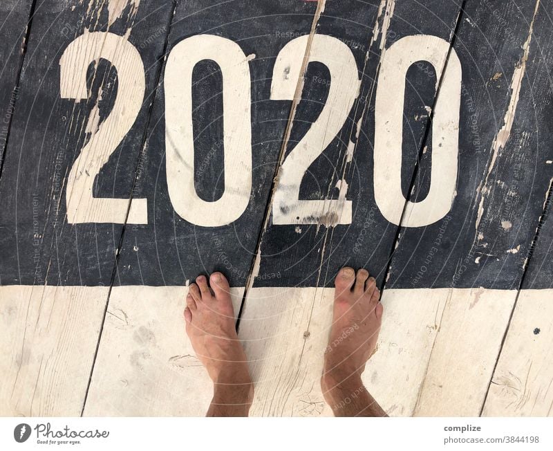 F**king Year! 2020 covid-19 coronavirus Year date Barefoot New Year's Eve Future figures number wooden floor Beach Feet Bird's-eye view annual review 2020 virus