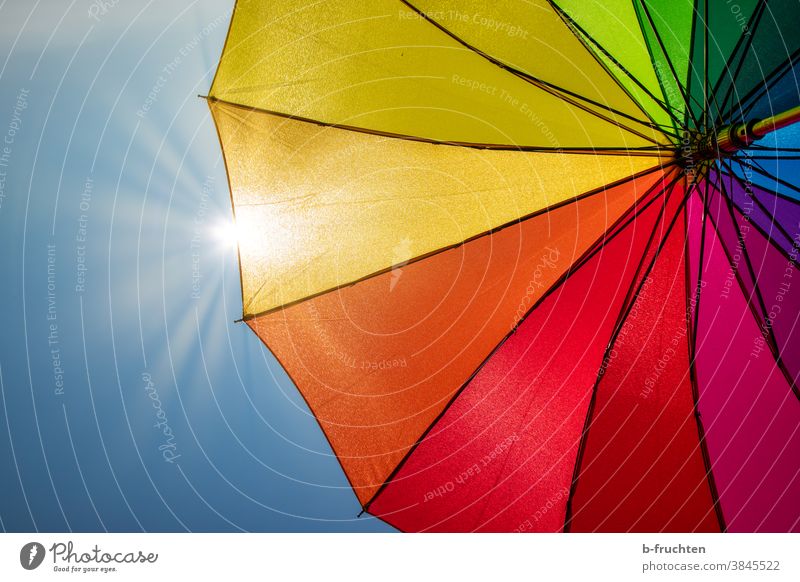 colourful umbrella in sunshine Umbrella variegated Colour Prismatic colors Sky Multicoloured Day Light Sunlight Sunbeam Back-light Sunshade Rain