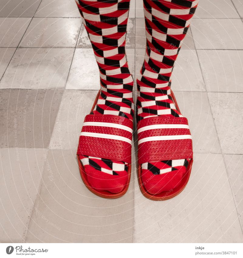 Patterned socks in red bath slippers Colour photo Close-up Bird's-eye view Feet feet Beach shoes Fashion Style Tasteless Exceptional differently Hideous