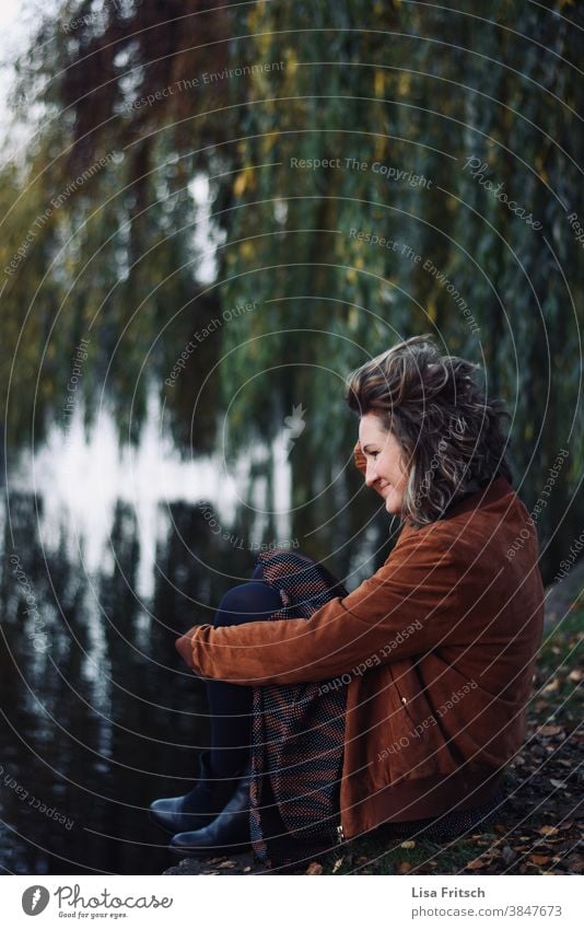 WEEPING WILLOW - WOMAN - AUTUMN Autumn Weeping willow Autumnal Water River sedentary Woman 30 - 45 years Young woman Curl Blonde Modern Reflection in the water