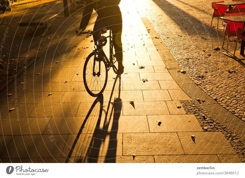 Bicycle in backlight Evening Architecture Berlin Sidewalk Office city Germany Twilight Cycle path Capital city House (Residential Structure) Sky downtown Middle