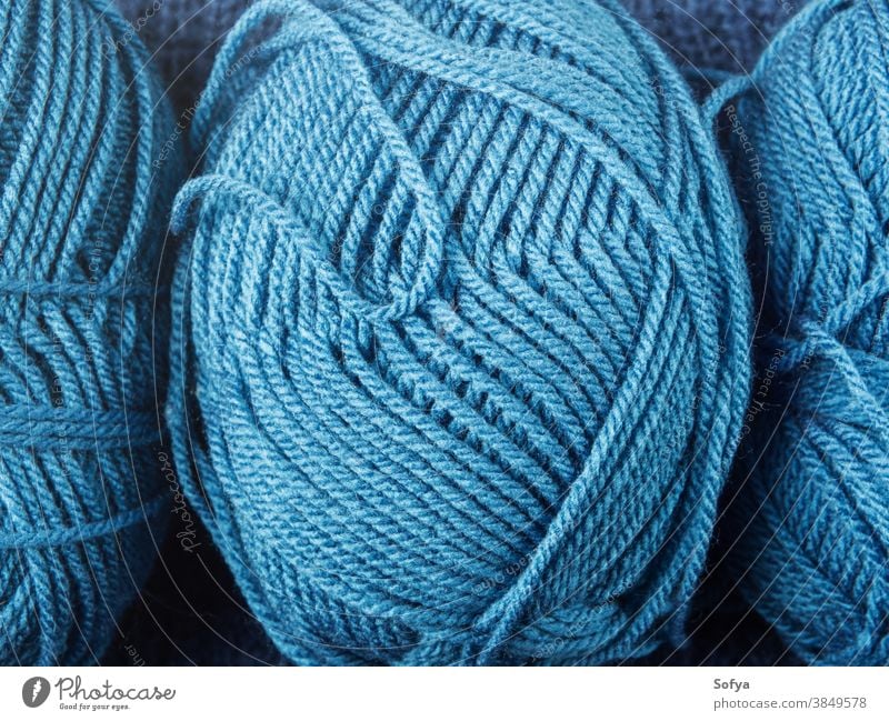 Blue wool knitting yarn texture background blue winter macro needlework hobby needles knitwear soft home tools care pastel above sewing comfort ball fashion