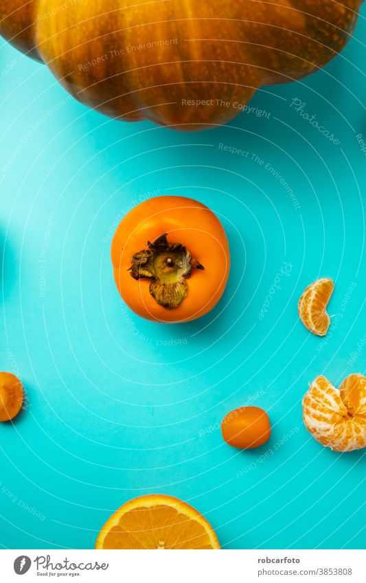 orange food on blue background fresh healthy nutrition delicious eating vegetable meal market vitamin many natural diet ripe vegetarian agriculture yellow fruit