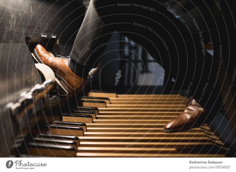 Playing organ with pedal Organ Church Music Dome Church service tool church music church musician Pedal Christianity Concert Musical instrument Feet Roll