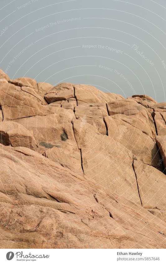 brown and grey rocky background rocks nature landscape exterior shot texture Rock stone
