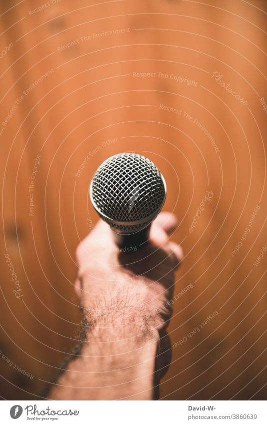 Microphone in hand - speech / announcement / lecture Speaker Speech presentation Hand Lecture Singer Musician Entertainment Event