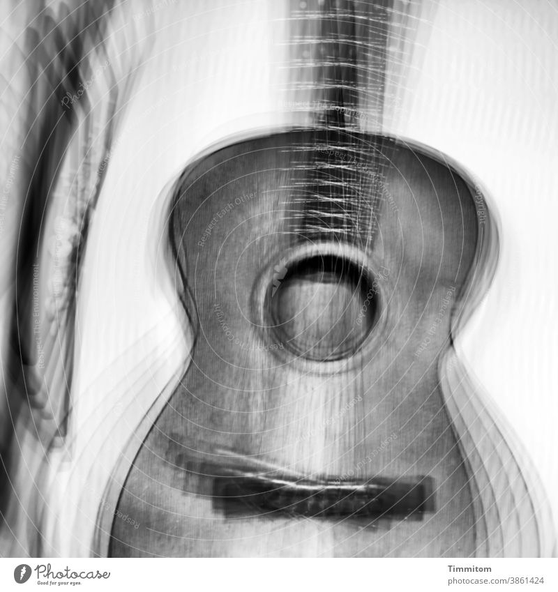 Going up, going down Music Guitar Blues feeling sensation high and low Musical instrument Acoustic Guitar string Wall (building) Image multiple exposure