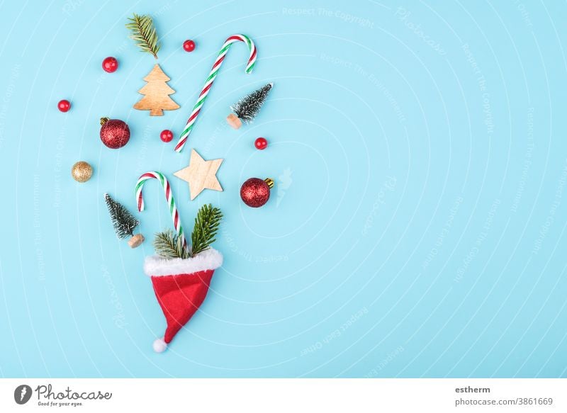 Merry Christmas.Christmas concept background.Santa claus hat with christmas ornament christmas tree christmas eve copy space celebration abstract