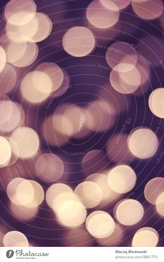 Blurred picture of christmas lights. blurred bokeh background Christmas city glow abstract shiny retro vintage effect filtered color decoration celebration