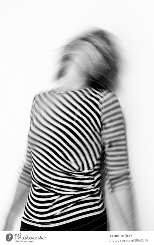 Woman going crazy in striped and black and white Striped Go crazy Fear Panic havoc Distress Grief on one's own Emotions Helpless corona crisis