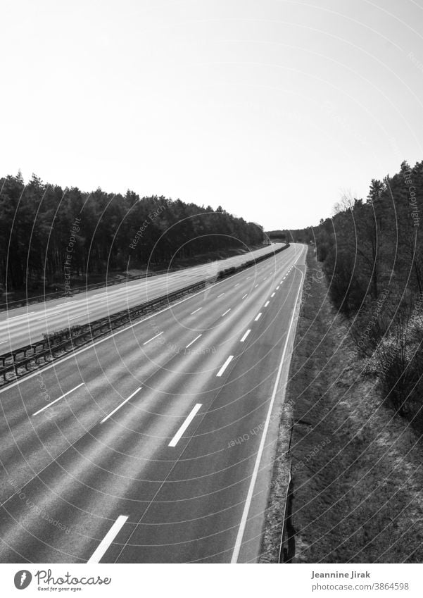 empty highway in lockdown Highway Traffic infrastructure Motoring Road traffic blocking Black & white photo Exterior shot tranquillity Climate protection