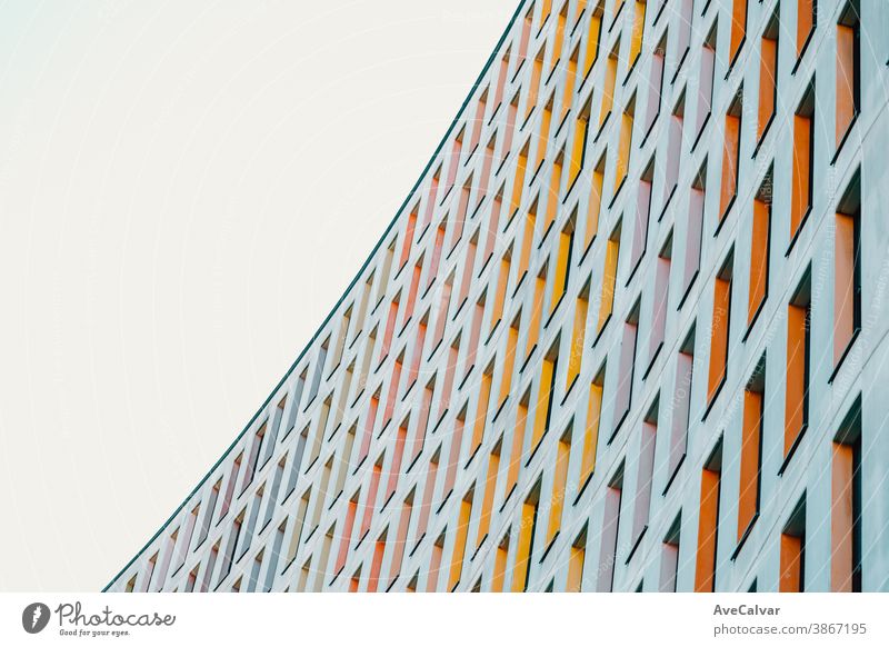 Colorful and symmetrical building with copy space and professional and minimalistic look skyscraper symmetry growth futuristic horizontal business color image