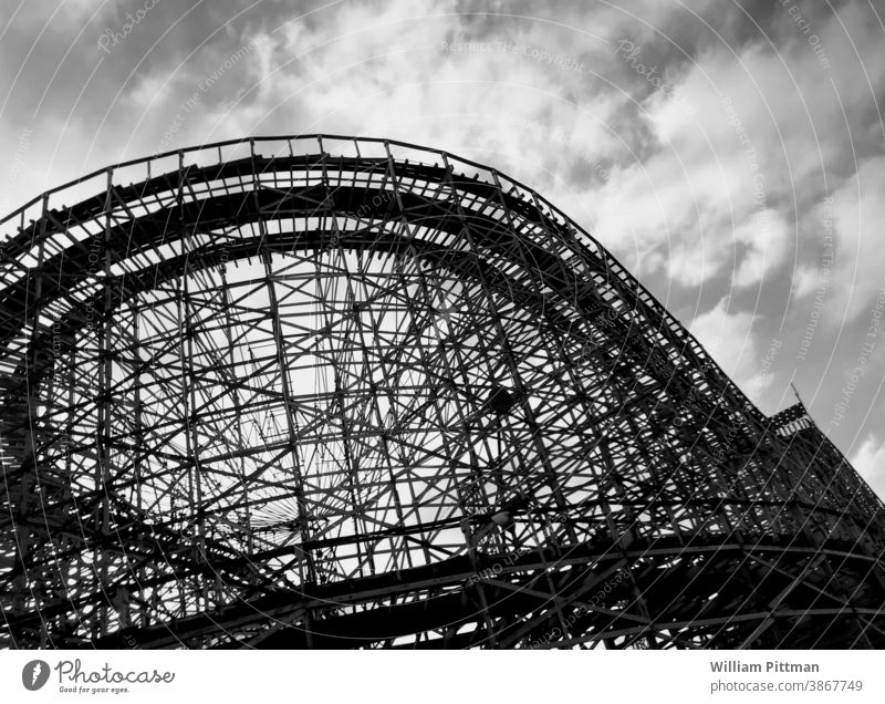 Roller Coaster in Black and White Roller coaster Amusement Park Exterior shot Theme-park rides Deserted Black & white photo Fear dark Dramatic Mysterious