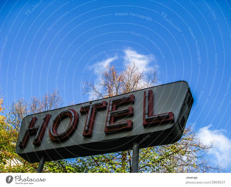 HOTEL Hotel Characters Neon sign Letters (alphabet) Sky Clouds Tourism Accommodation Signage Typography Signs and labeling Hotel industry Tree