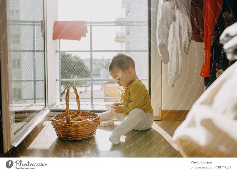 Toddler playing at Home Child childhood 0 - 12 months Colour photo Baby Infancy Cute Small Family & Relations Interior shot Human being Day Caucasian Happiness