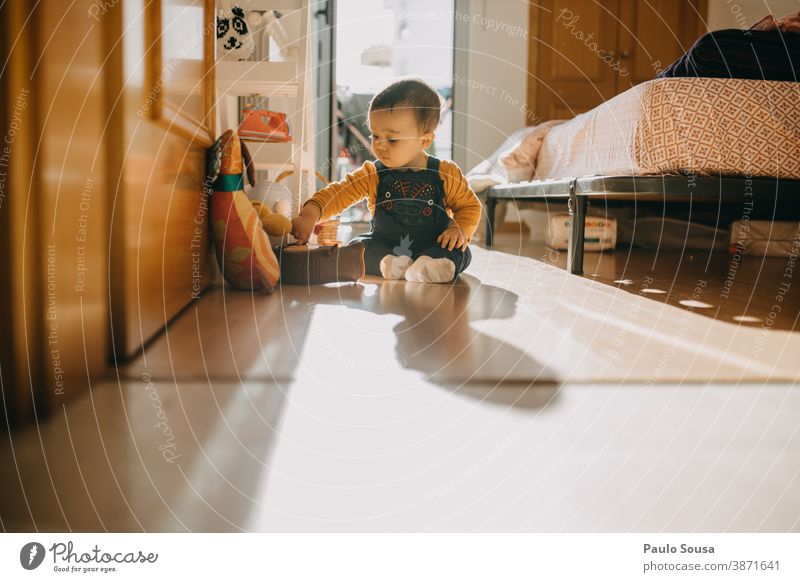 Toddler playing at home indoors Authentic cute stay at home childhood little Child kid Infancy Interior shot Light Boy (child) Family & Relations Quarantine