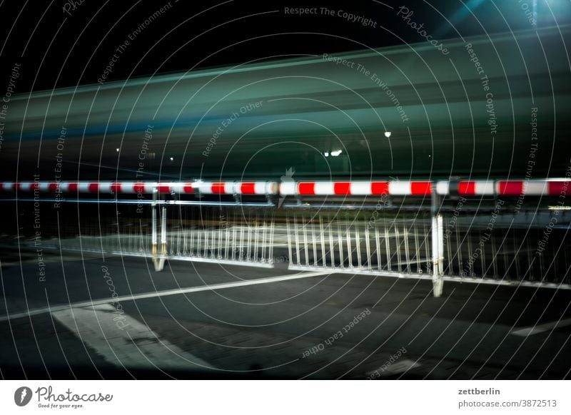 Closed barrier with train passage Evening Movement motion blur blink variegated Dynamics Railroad fantasy flicker Art Light Visual spectacle light track Line