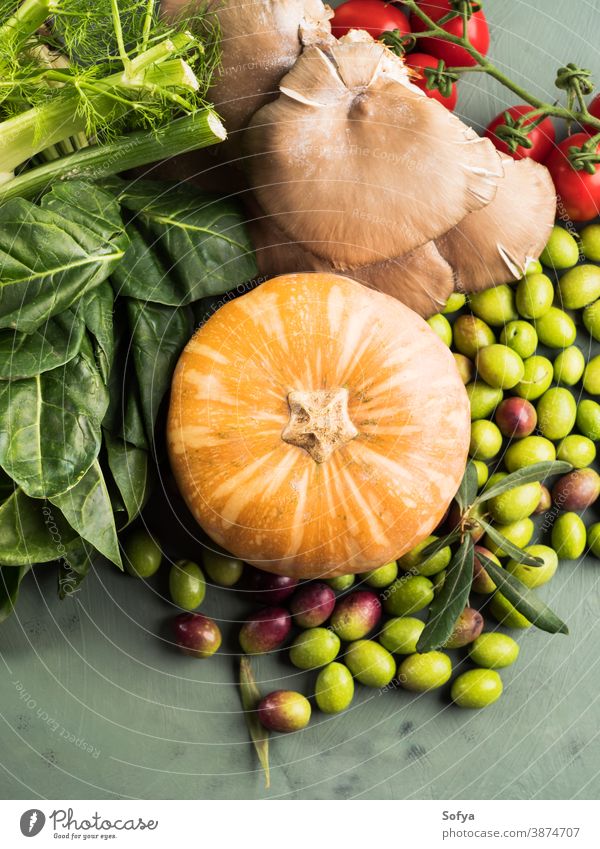 Green background with raw organic vegetable, fruit fresh food ugly autumn green vegan rustic harvest healthy market assorted diet tomato top view mushroom farm