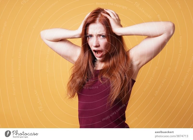 frustrated angry woman holding her head screaming expression emotion headache frustration people mad stress upset young adult person female girl unhappy gesture
