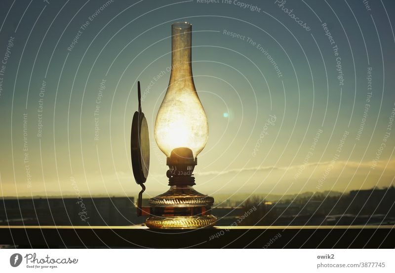 energy-saving lamp Old luminescent Brilliant Sun Sunlight Translucent Mysterious Cloudless sky Horizon Town Balcony Above wide silent Lens flare Glass Metal