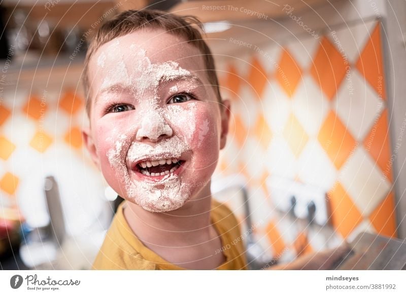 Little boy baking with flour on his face make Christmas Christmas baking Baking Flour muck about fun Playing Happy Child Infancy Joy Lifestyle Christmas biscuit