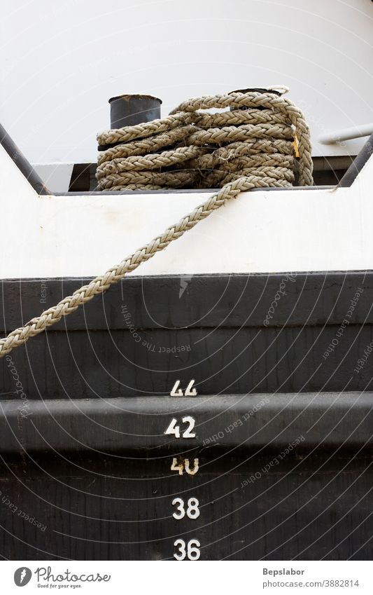 Vessel part with rope and gradual numbers boat close-up coil connect connection cord cotton fasten forget hemp horizontal kink knot line loop marina marine