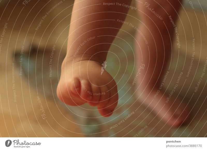 Step by step. Legs and feet of an infant. Children's foot Toddler Ascending Stand Toes Above Barefoot Going locomotion motor function Infancy Pride Reach