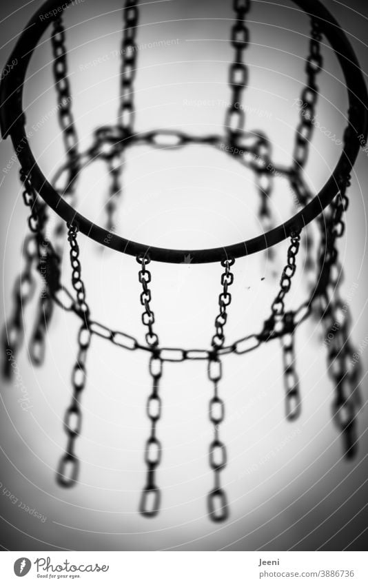 Basketball hoop in black and white against a light background | Metal frame and chains Basketball arena Chain Chain link Framework Basketball basket Sky