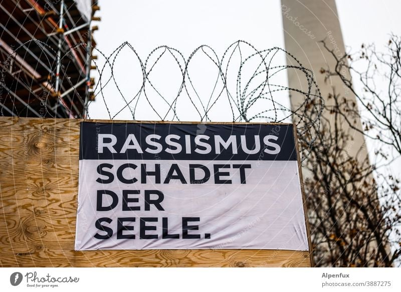 Racism harms the soul Politics and state Solidarity Society Responsibility Fairness Human rights Signs and labeling Humanity Racism problem Racism in Germany