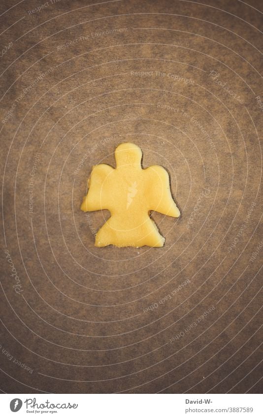 Angel cookies for Christmas as dough cut out on baking paper Christmas baking Cookie Christmas & Advent cookie cutter Christmas biscuit Baking christmas time