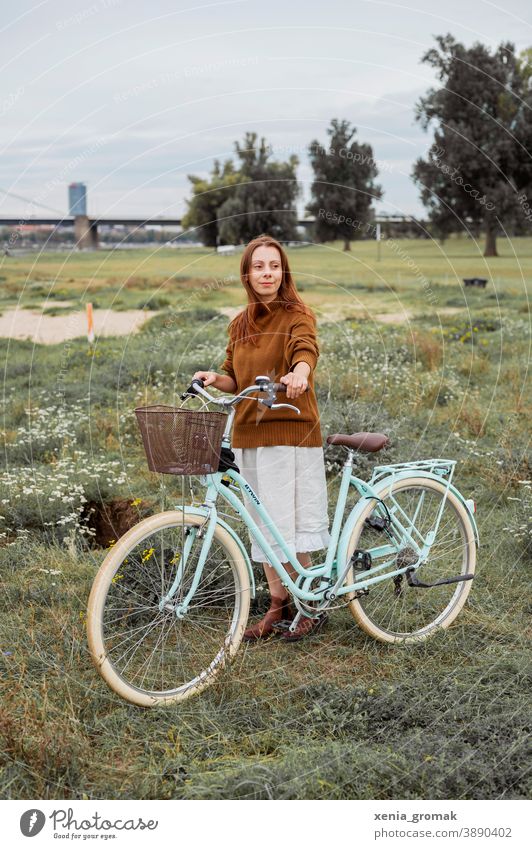 Woman with bicycle in the nature Love of nature Bicycle Cycling tour Sustainability sustainability vintage Vintage girls Vintage style Picnic Freedom