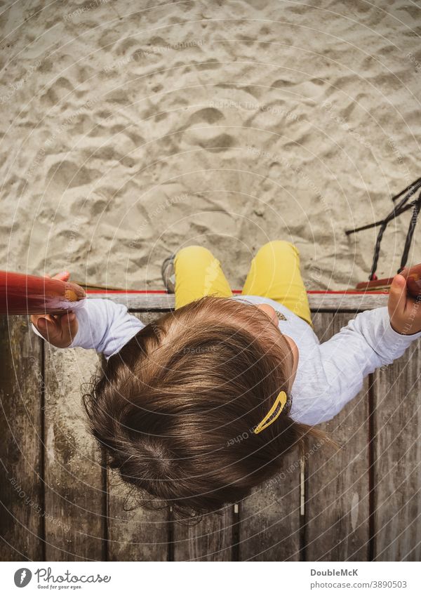 Girl sitting on platform of a playground Child Toddler Playing Infancy Colour photo Joie de vivre (Vitality) Movement Human being Exterior shot Joy