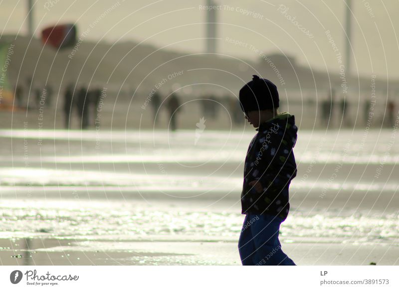 silhouette of a boy on the beach Boy (child) Faith & Religion praying Prayer background Forward Contentment Posture Vacation & Travel people Upper body candid