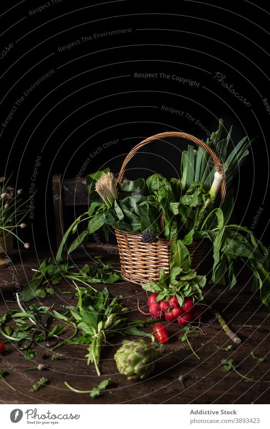 Fresh green herbs and radish on table vegetable leaf food basket various edible organic natural healthy fresh wicker raw harvest plant vitamin nutrition