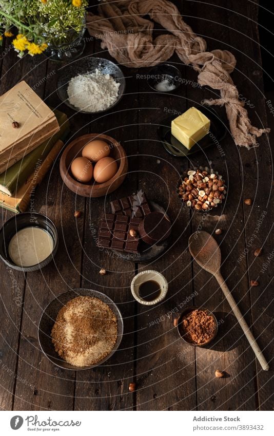 Ingredients for pastry recipe with chocolate and hazelnuts ingredient sweet various set food prepare bake cuisine culinary butter egg cocoa flour assorted
