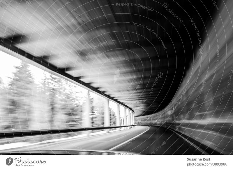 Passing through a tunnel Tunnel motion blur Speed Movement Driving Street In transit travel blurriness Traffic infrastructure Tunnel vision Light Motoring swift