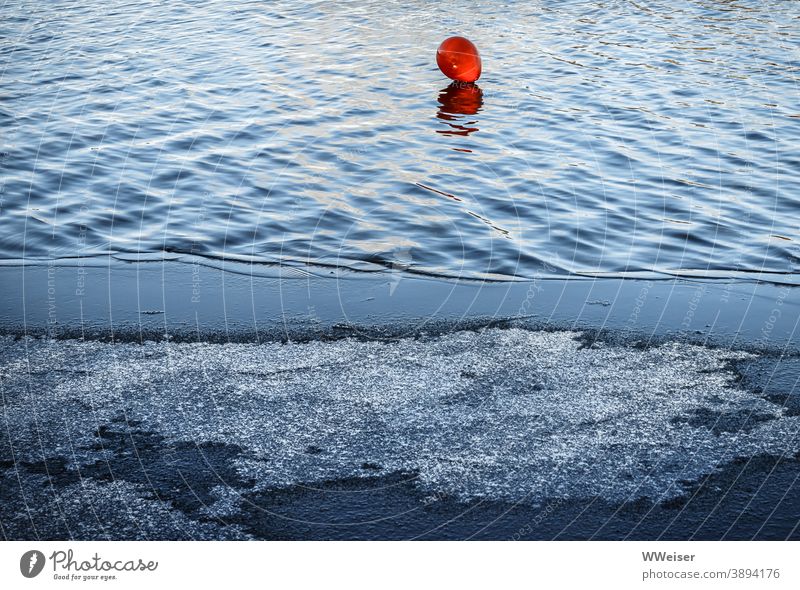 The red balloon has lost its way from the summer onto the icy water Balloon Red Lake Ice Cold Winter Light Waves Pattern Frozen Freeze Contrast Warm-Cold Frost
