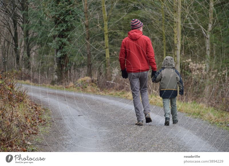 Wanderlust | man with child walking in autumn forest on a forest path Family Father Child Man Son men in common Trip wanderlust Autumnal Forest Going