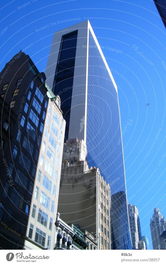 bIIIg High-rise New York City Architecture had Blue sky Sun