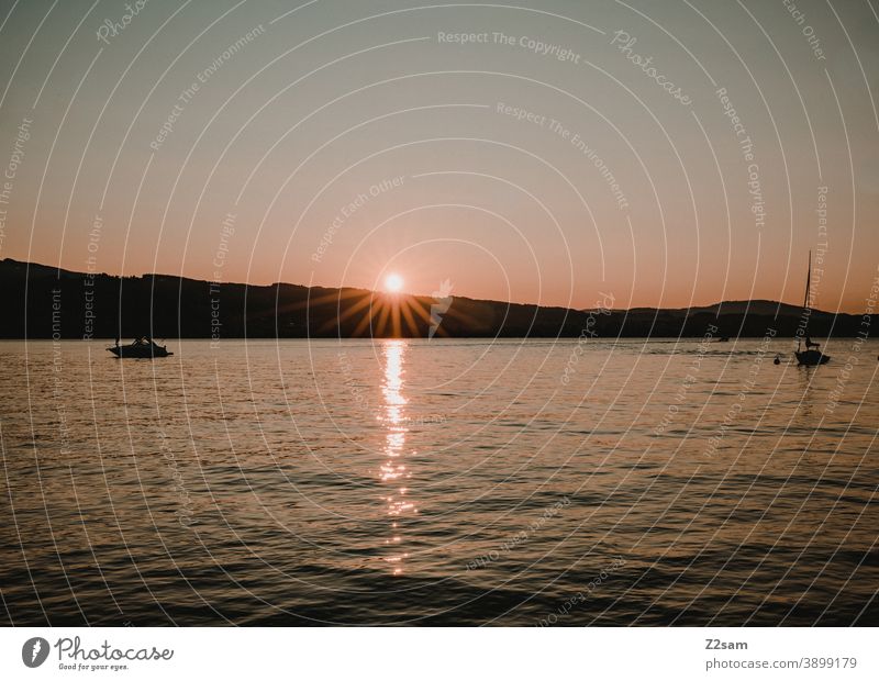 Attersee evening mood Sunset ships sailboats tranquillity relaxation Relaxation holidays vacation Summer Nature Water Exterior shot Landscape sunset